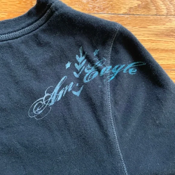 🛑 SOLD! 🛑 American Eagle. Black V-Neck T-Shirt with White Graphic. Size medium. - Picture 10 of 12